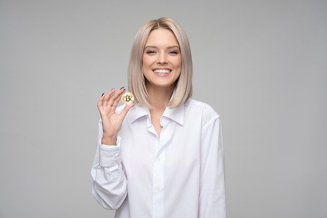 Koin Bitcoin dan wanita